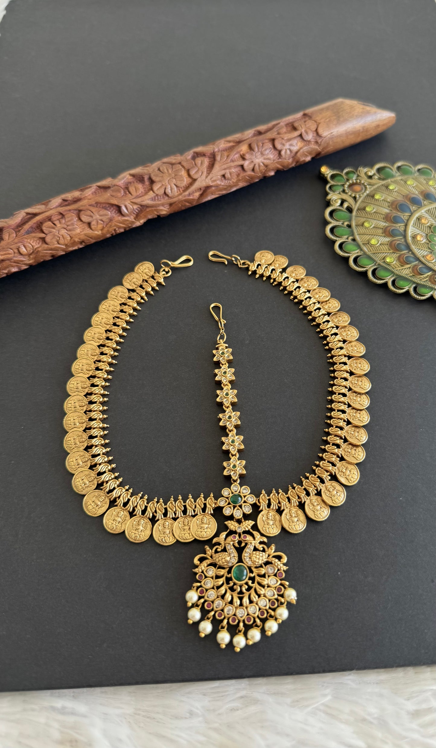 Antique gold tone cz pink-green lakshmi coin peacock tikka dj-52059