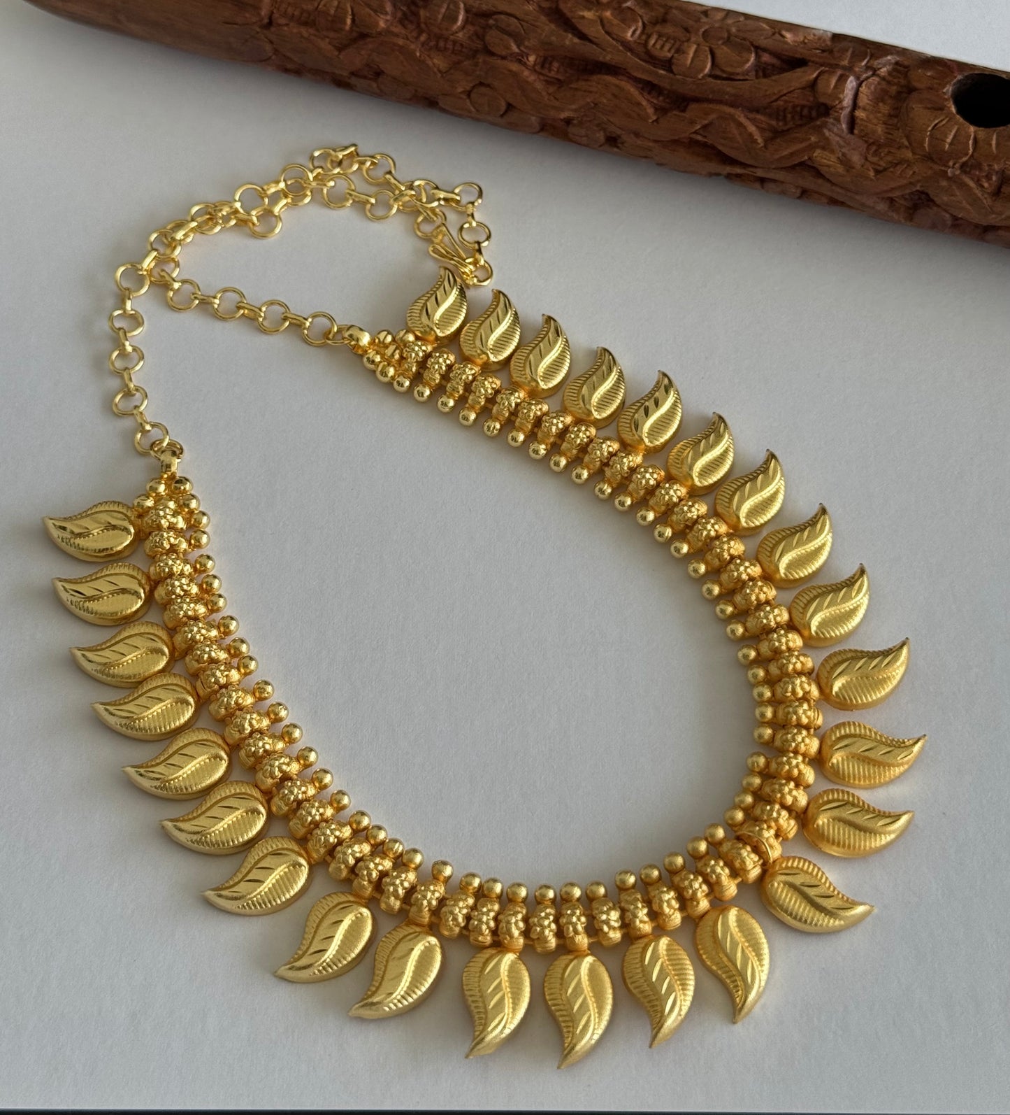 Matte gold tone kerala style mango necklace dj-51653