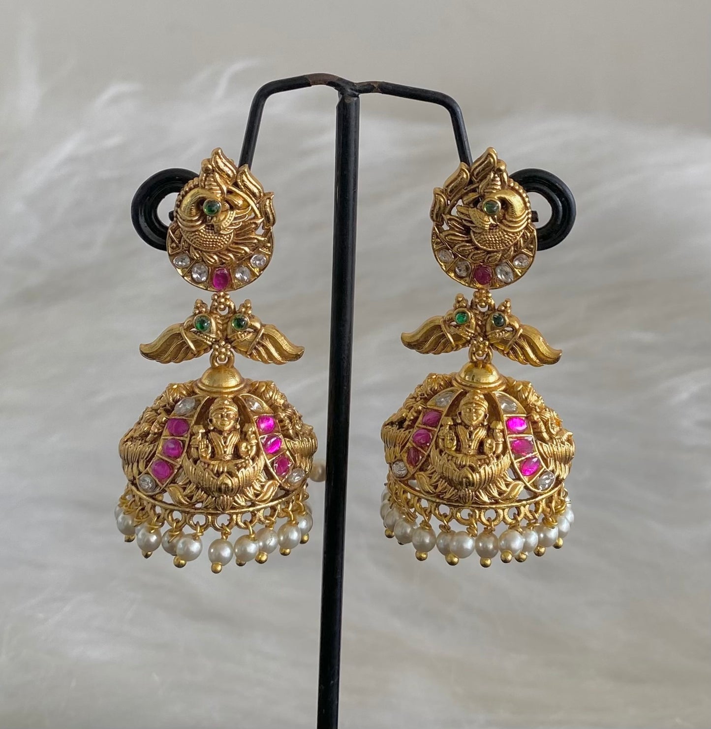 Gold tone pink-green-white stone peacock lakshmi pearl jhumkka dj-54598