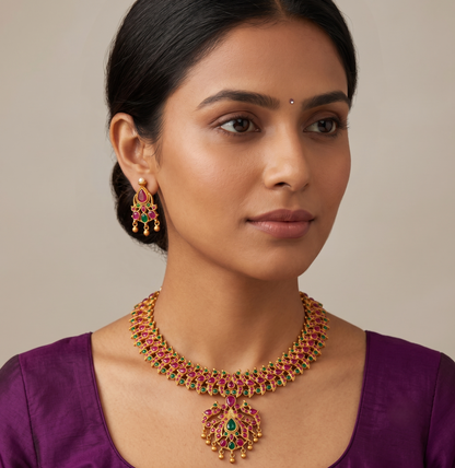 Matte finish ruby-emerald peacock necklace set dj-11008