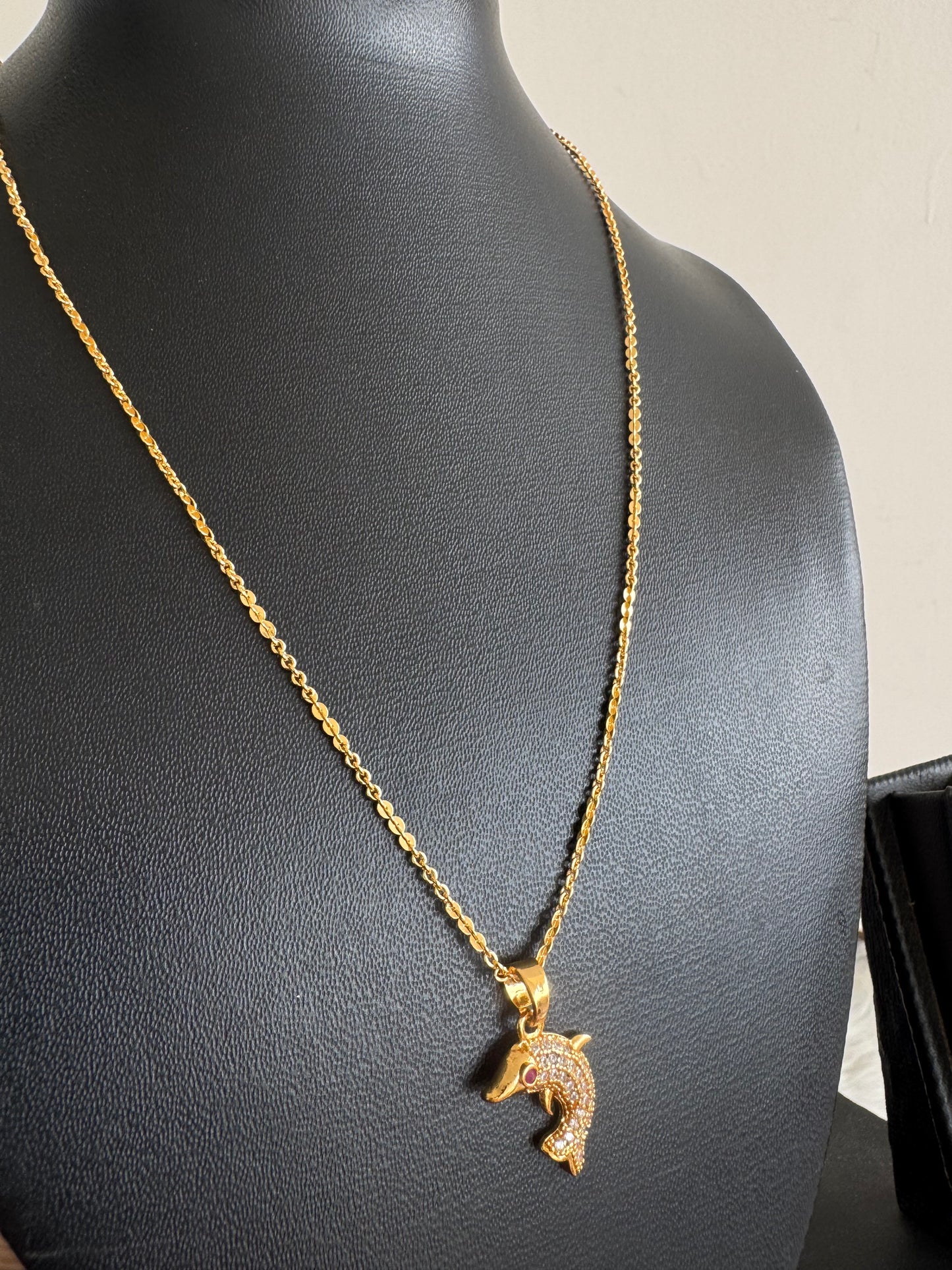 Gold tone 18 inches chain with ruby-white dolphin pendant dj-47599