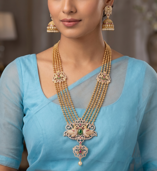 Gold tone cz ruby-green multilayer peacock haar set-dj11499