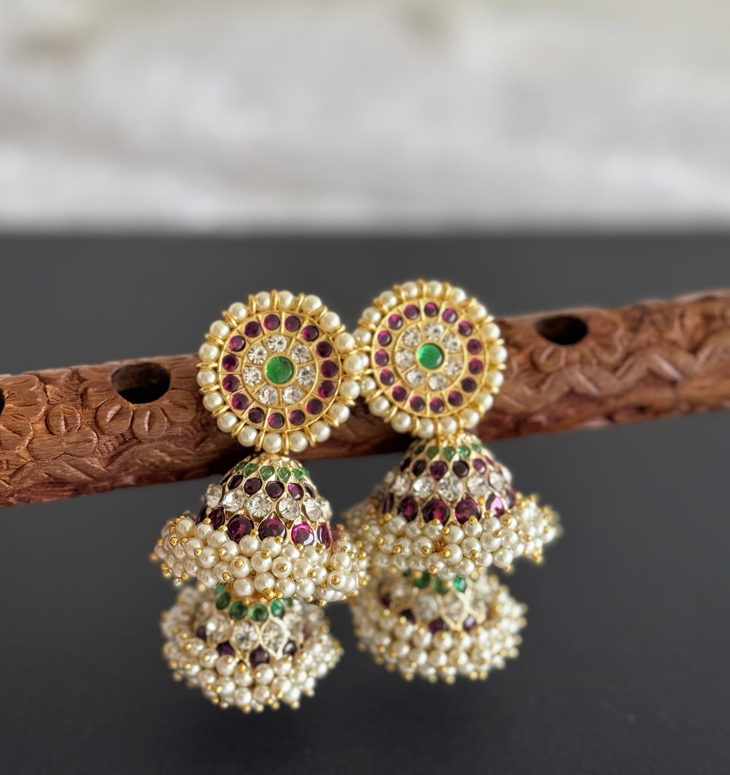 Gold tone precious kemp-green-white stone pearl big step jhumkka dj-51451