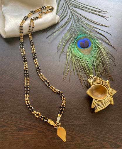 Gold tone black karimani double layer mala with elakka thali pendant dj-35567