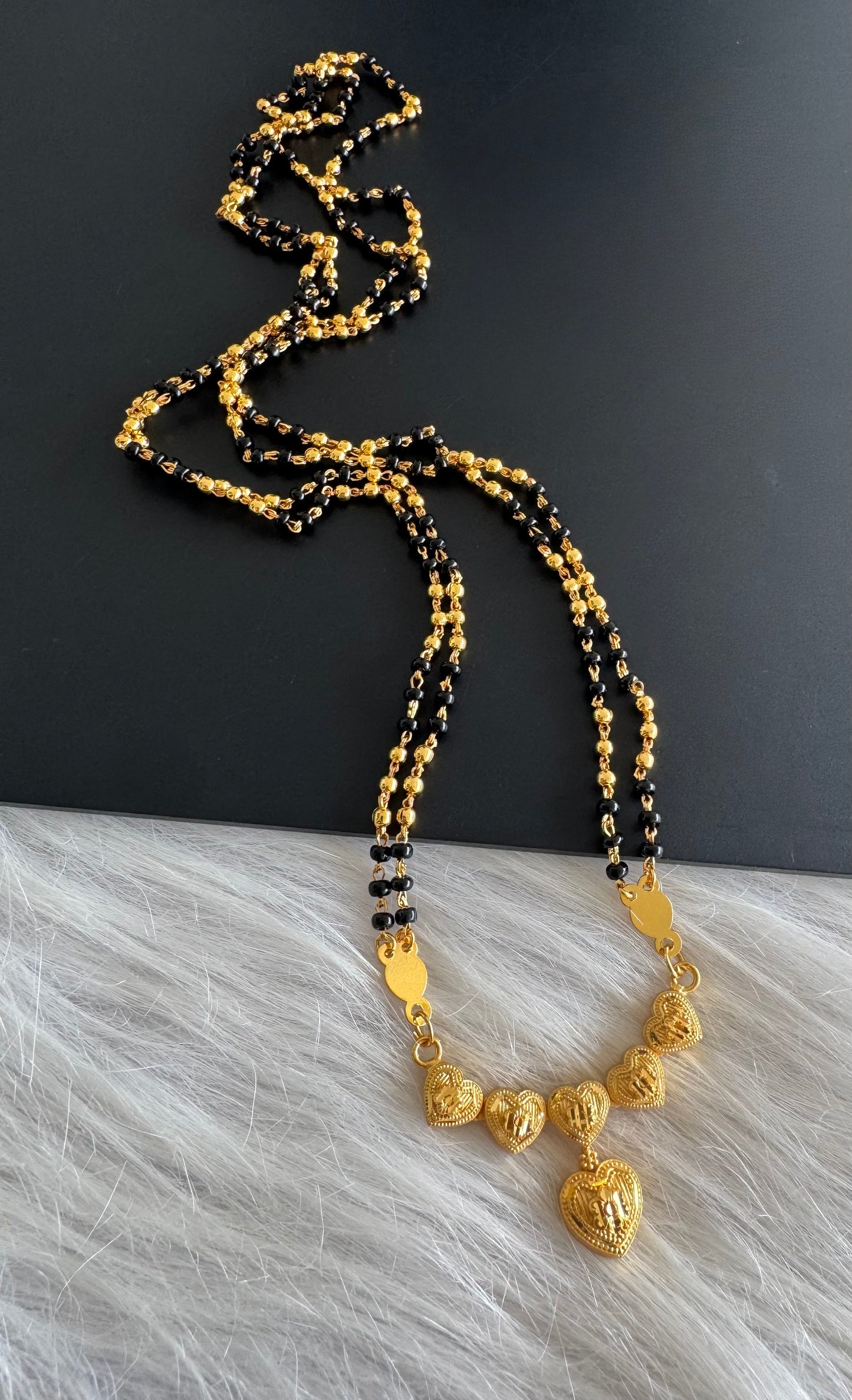Gold tone 24 inches karimani chain with heart pendant dj-51270
