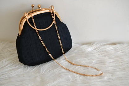 Tanjore painted black silk clutch dj-52659