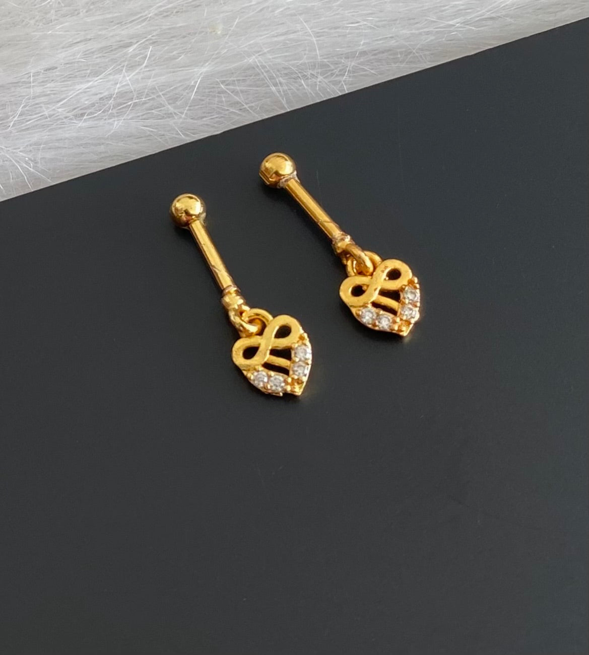 Gold tone cz white stone bugadi screw earrings dj-55127