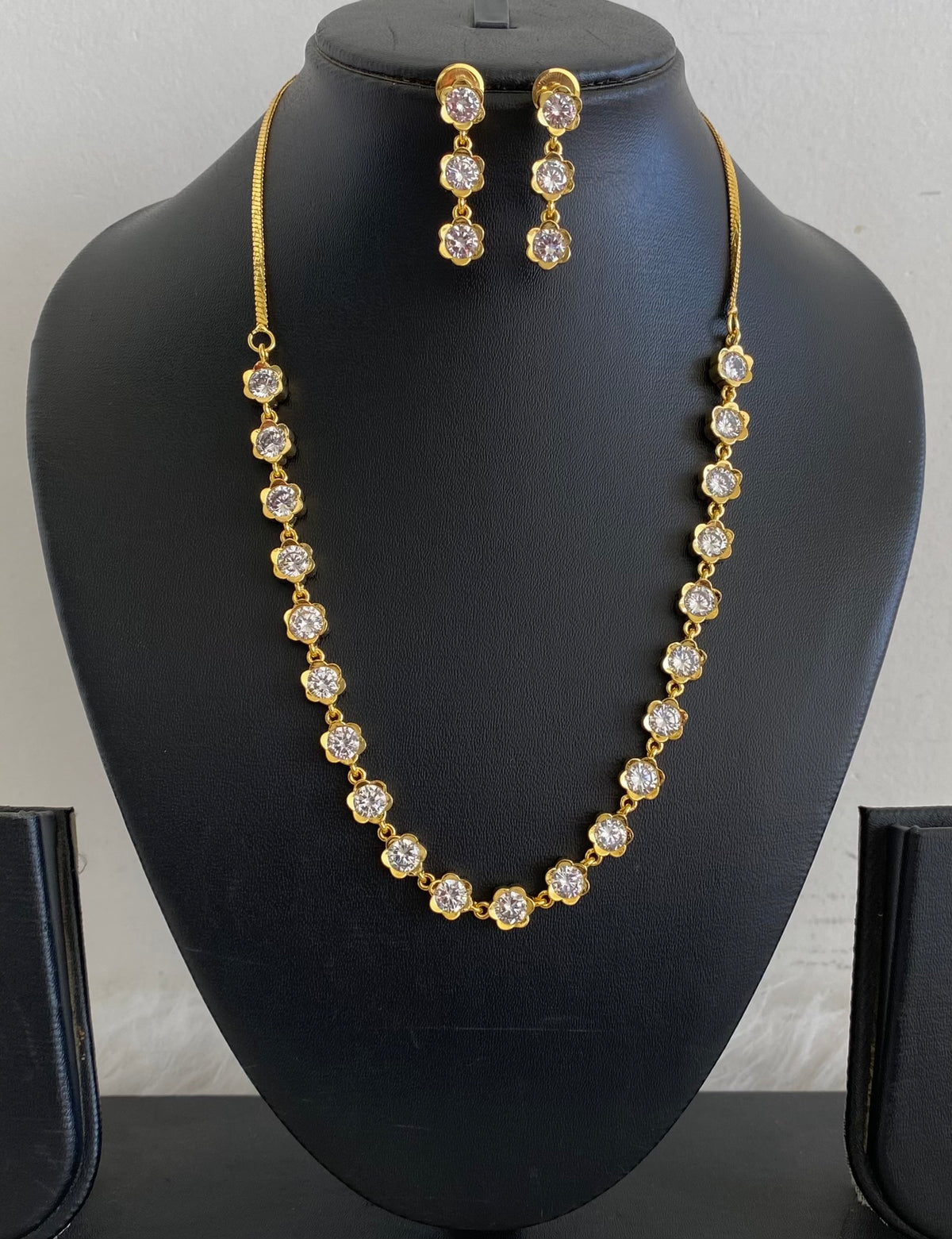 Gold tone diamond look white stone necklace set dj-54763