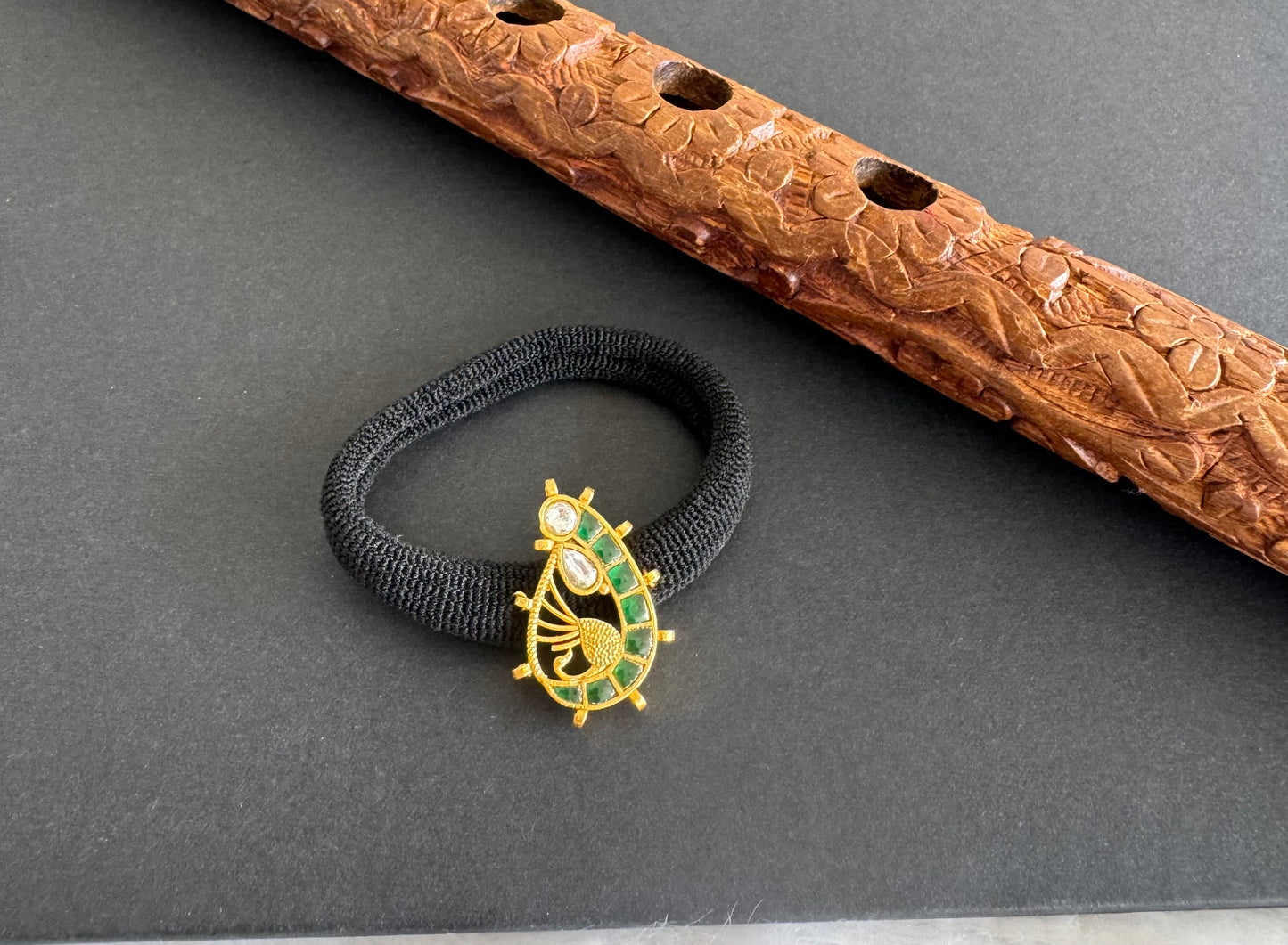 Gold tone green kundan jadau peacock hair band dj-51490