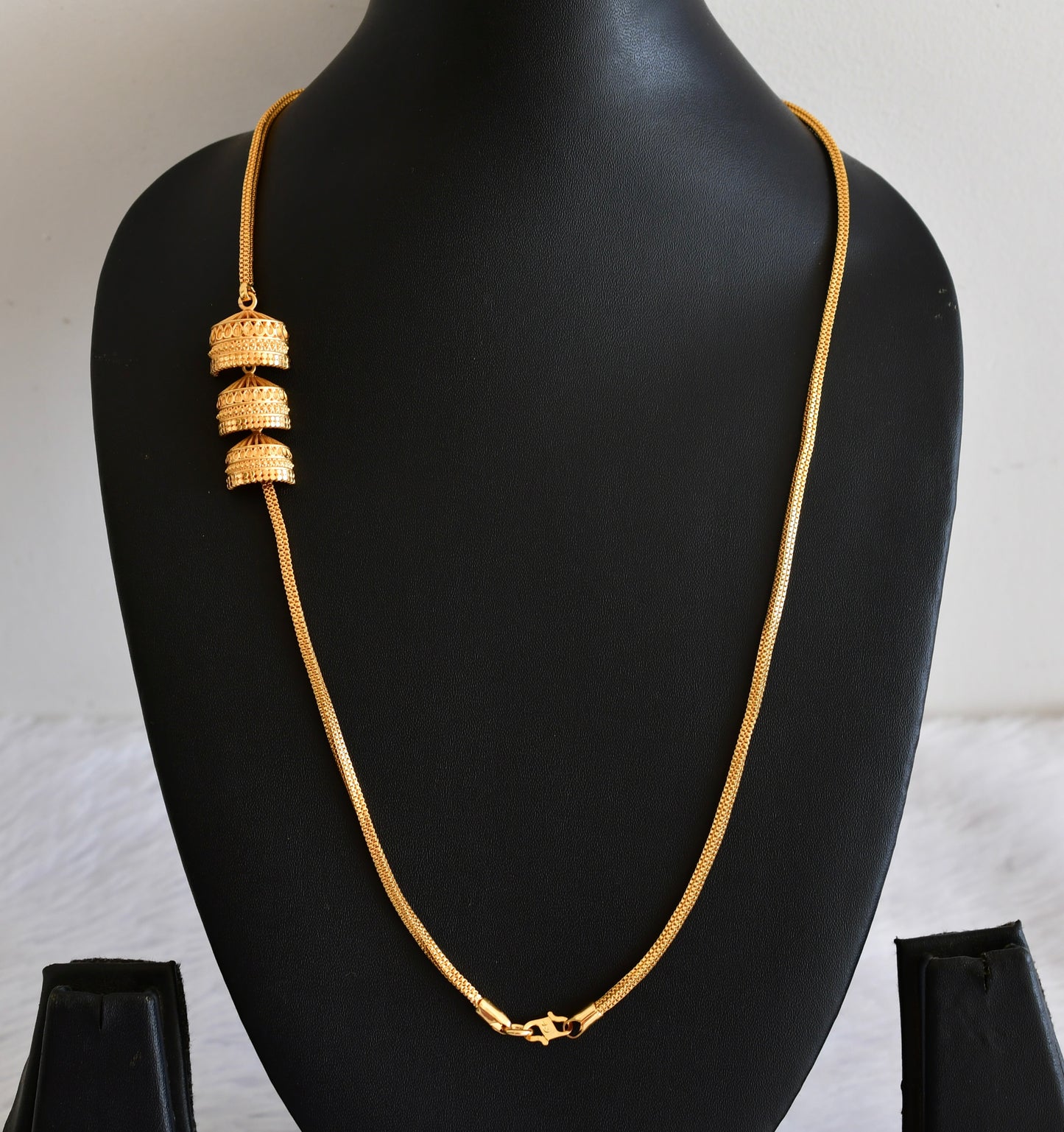 Gold tone 24 inches jhumkka style mugappu chain Dj-53314
