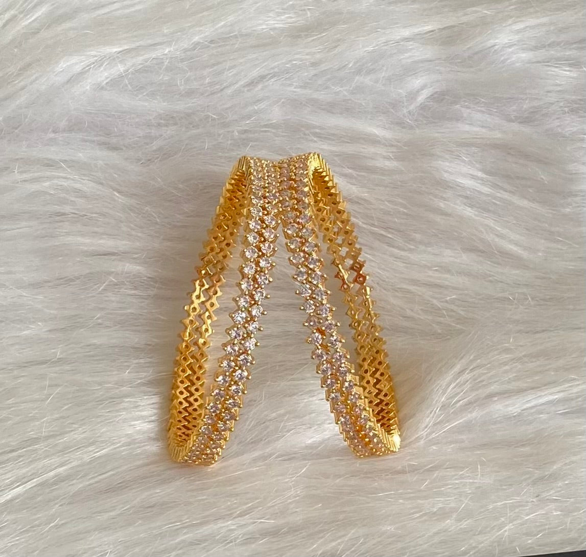 Gold tone white stone set of 4 bangles (2.6) dj-54827