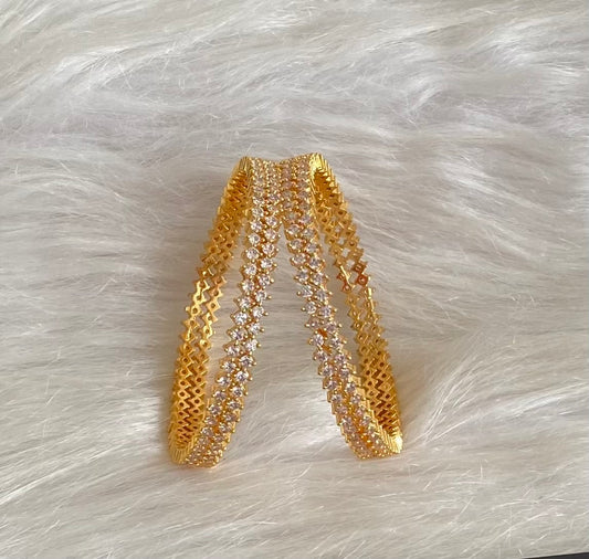 Gold tone white stone set of 4 bangles (2.8) dj-54828