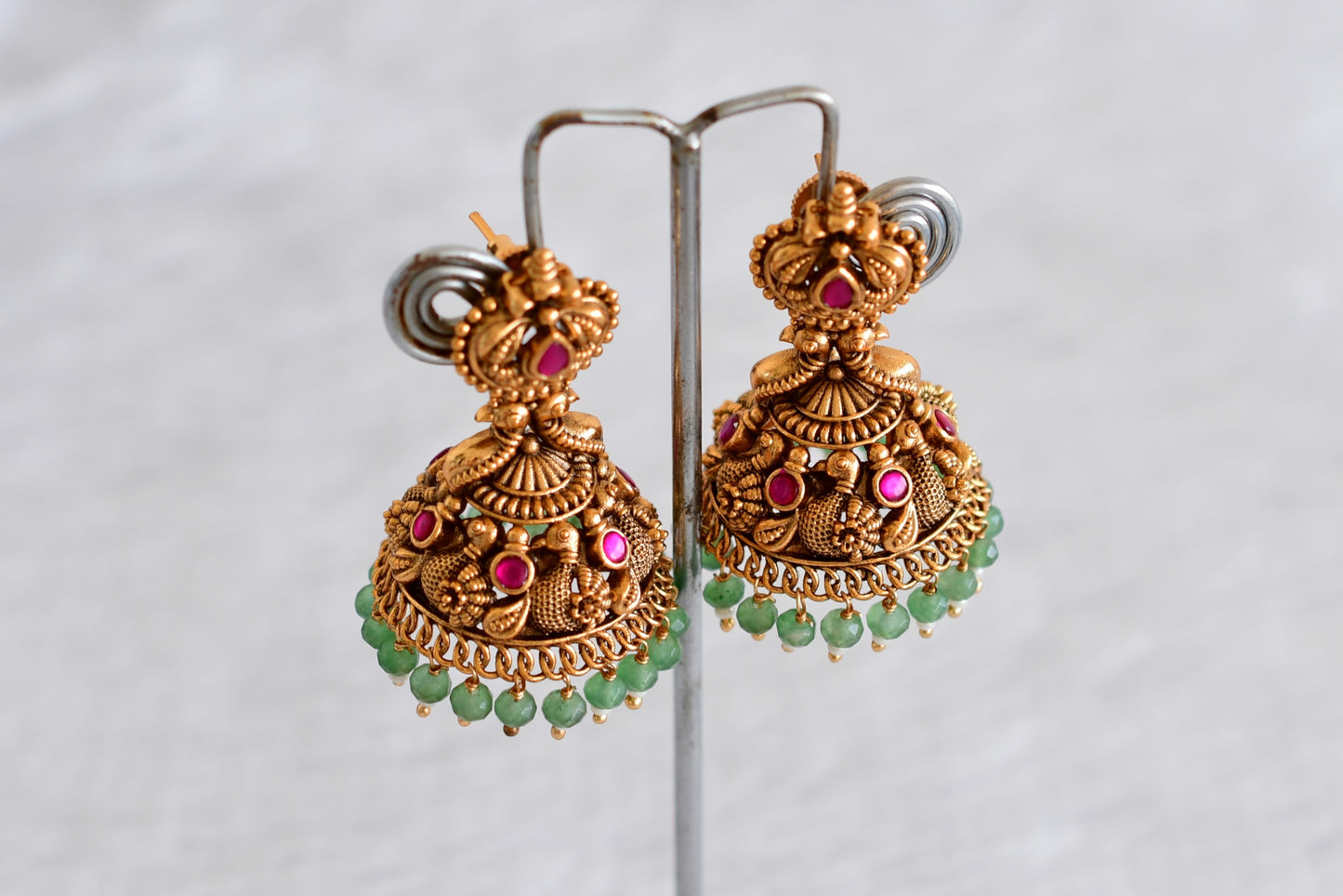 Antique gold tone pink green beaded swan jhumkka dj-52504