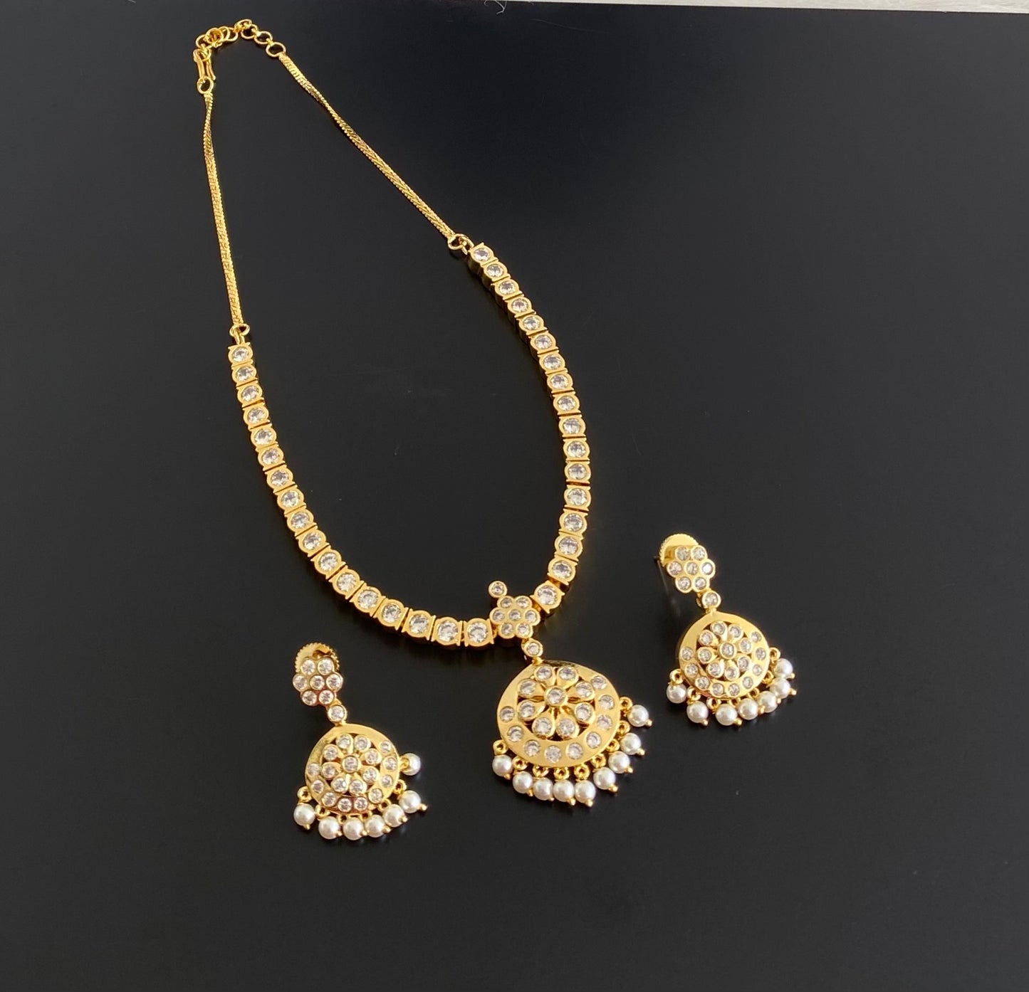 Gold tone Ad white stone South Indian attigai/necklace set dj-11436