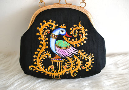 Tanjore painted black silk clutch dj-52659