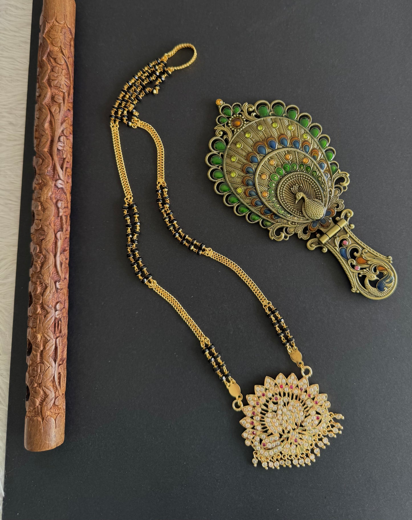 Gold tone 24 inches Karimani chain with AD peacock pendant dj-52228