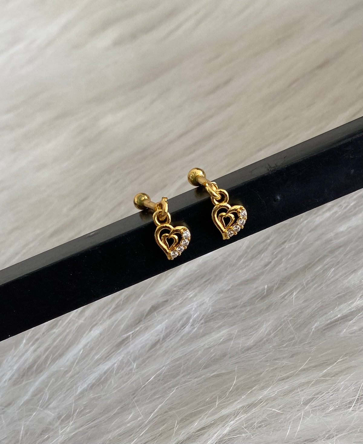 Gold tone cz white stone bugadi screw earrings dj-55122