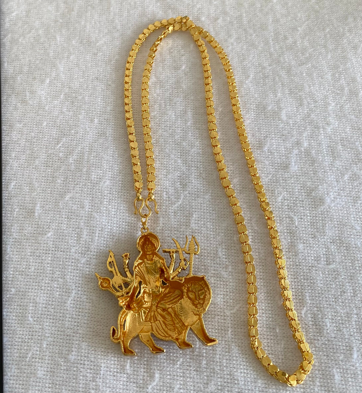 Gold tone 24 inches chain with red meenakari ma durga pendant dj-55018
