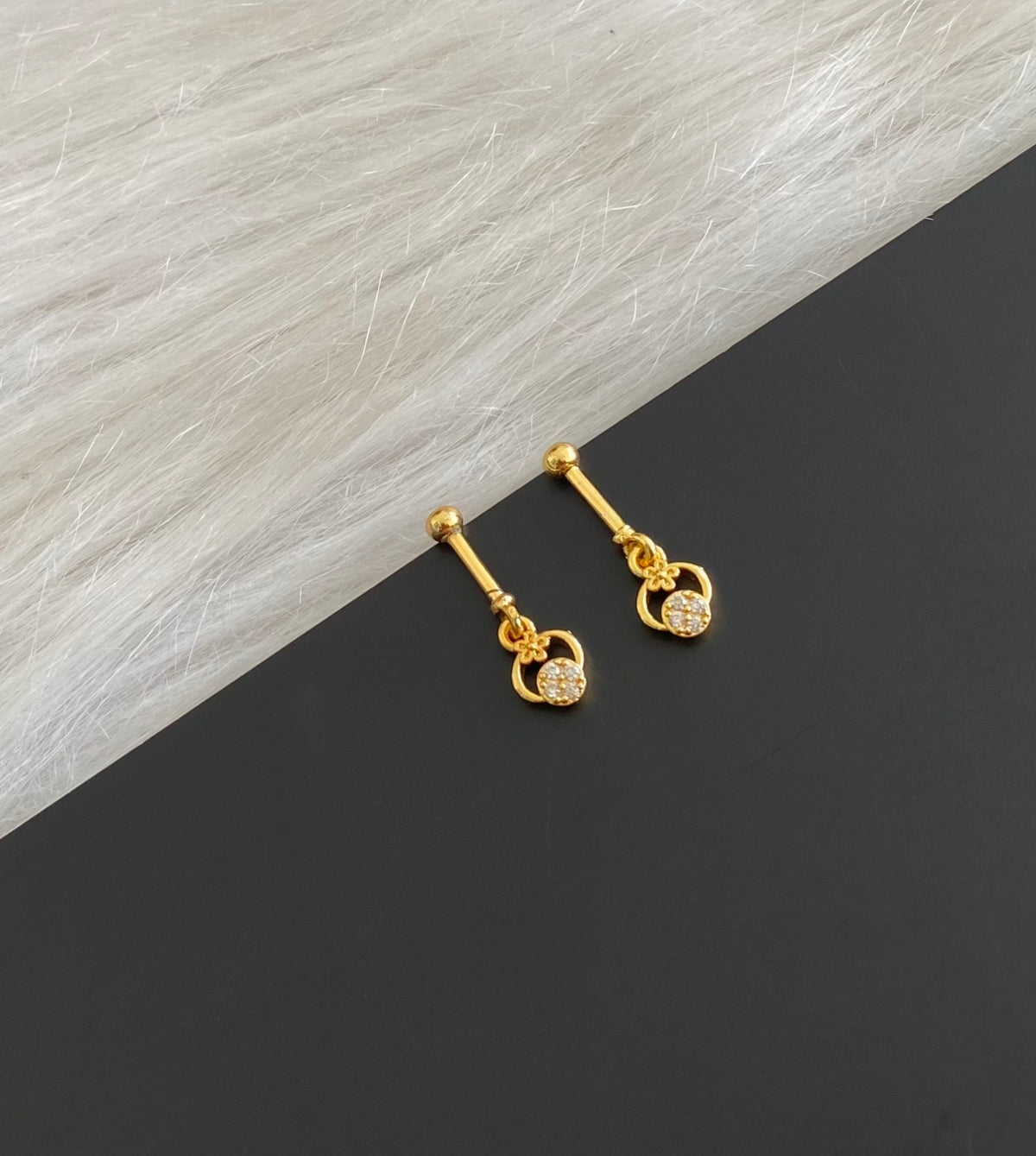 Gold tone cz white stone bugadi screw earrings dj-55126
