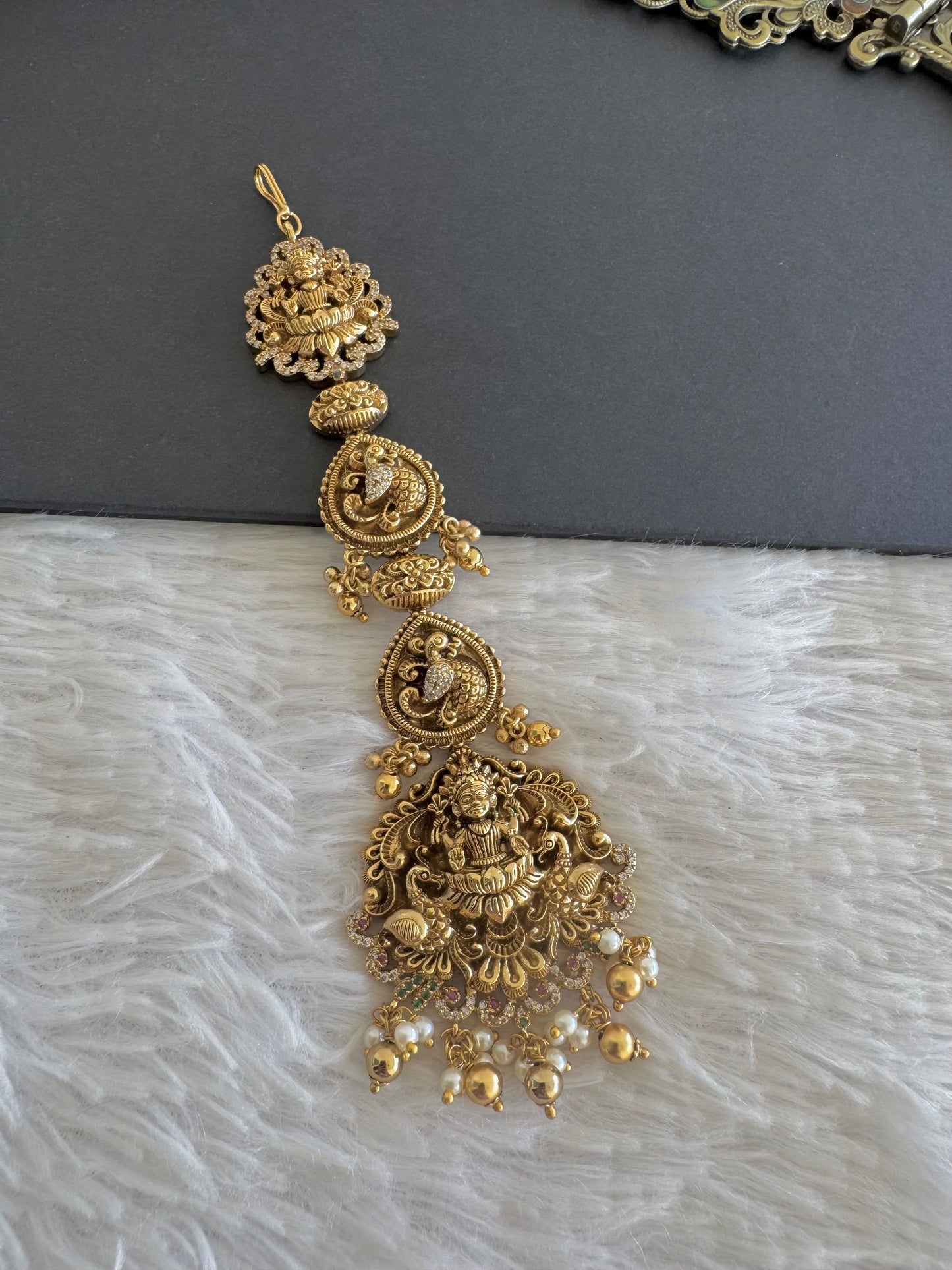 Antique gold tone cz white lakshmi peacock tikka dj-52058