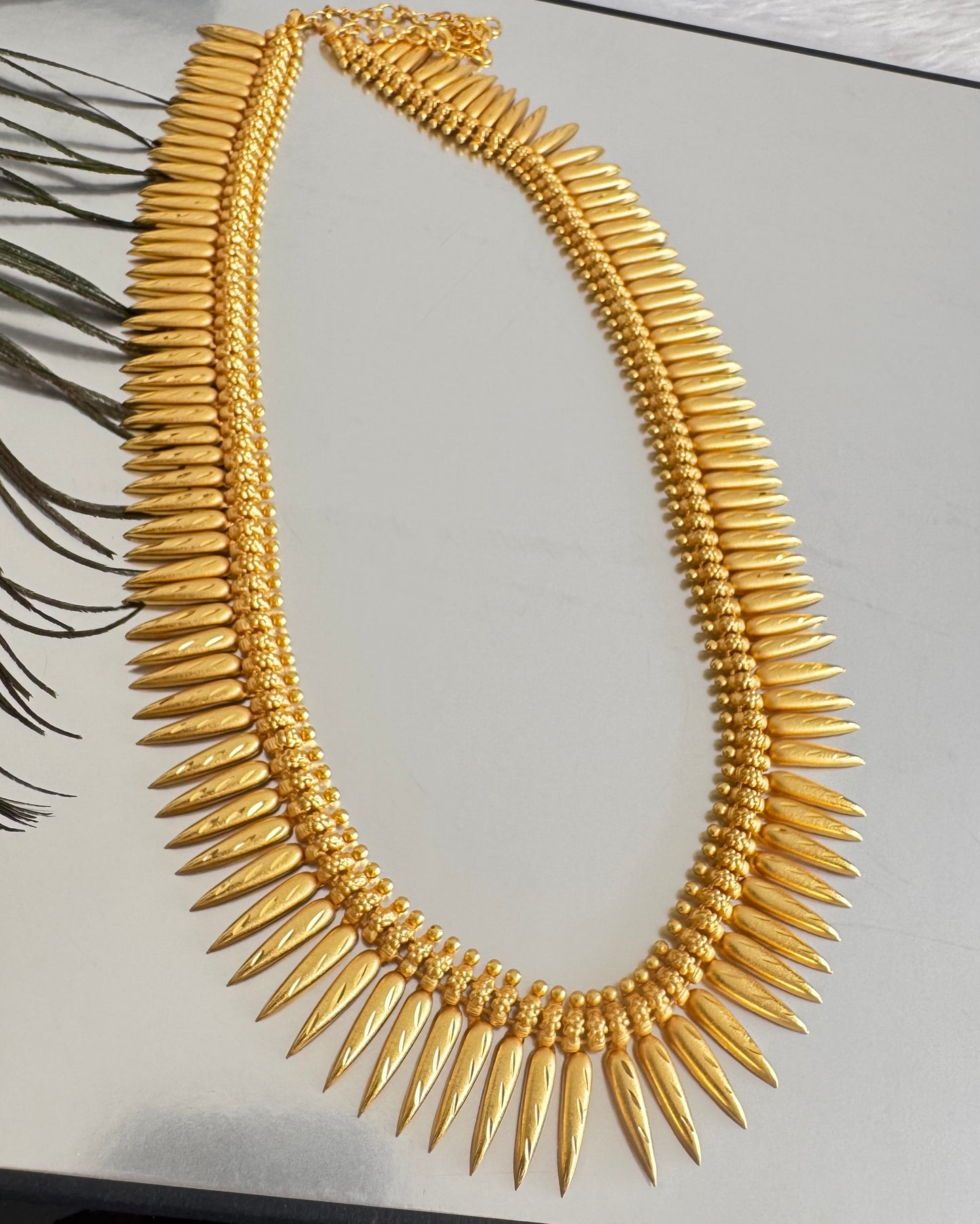 Matte gold finish kerala style mulla mottu haar dj-51632