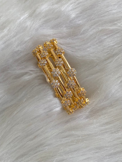 Gold tone white stone set of 4 bangles (2.6) dj-54824