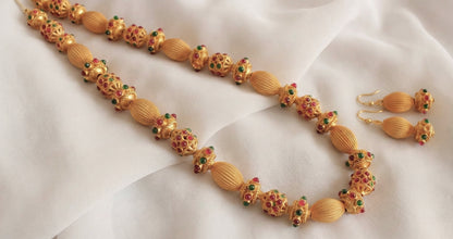 Matte finish Kemp-green beaded necklace set DJ18130