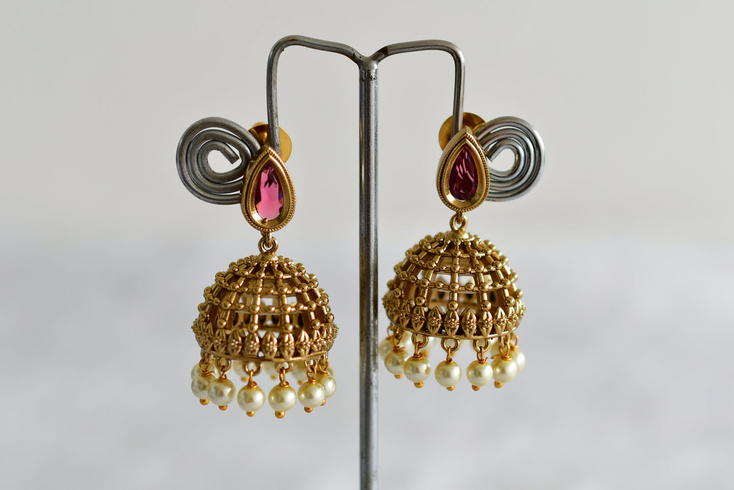 Antique gold tone magenta pink thilak stone pearl jhumkka dj-51851