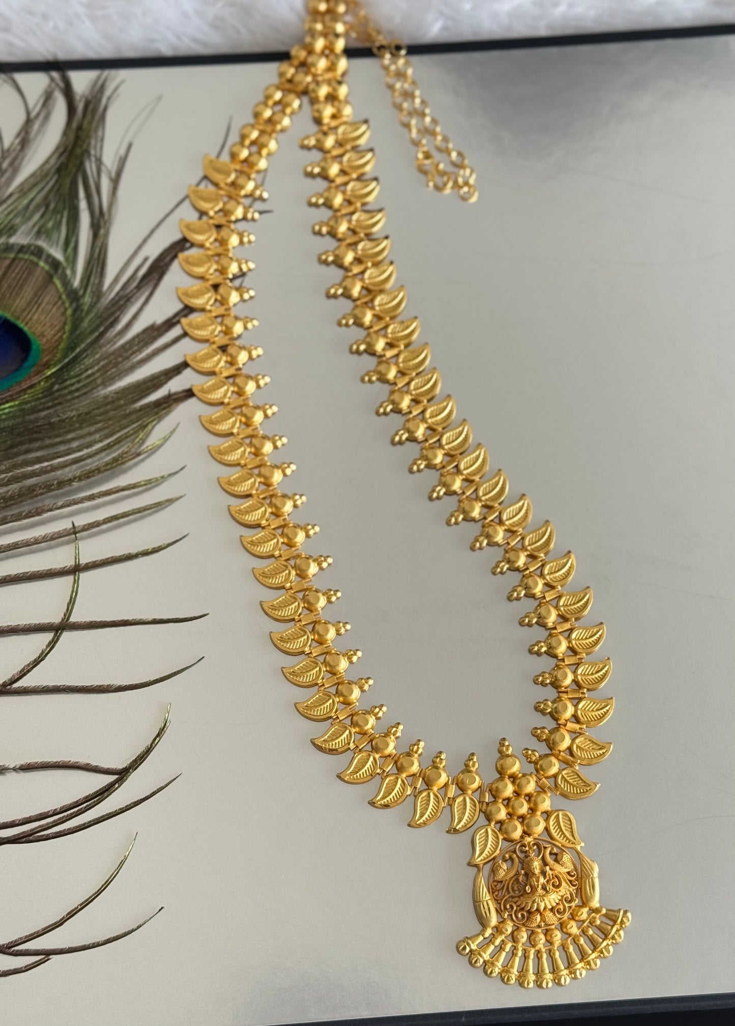 Matte gold tone kerala style mango lakshmi short haar dj-51624