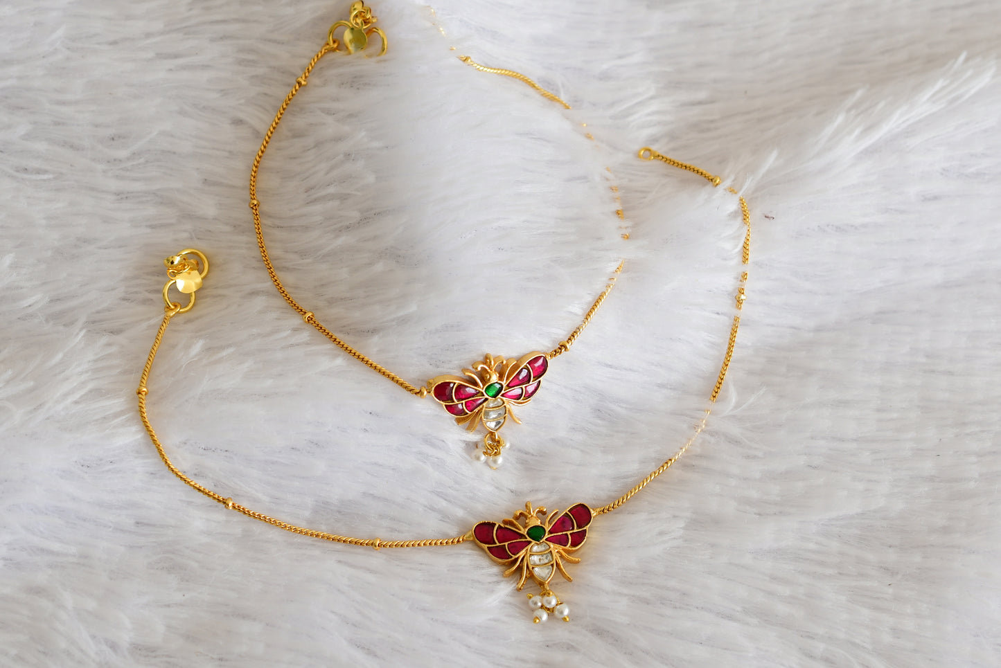 Gold tone pink-green pearl butterfly kundan jadau anklets dj-52387