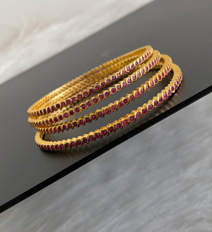 Gold tone pink stone set of 4 bangles(2.10) dj-55152