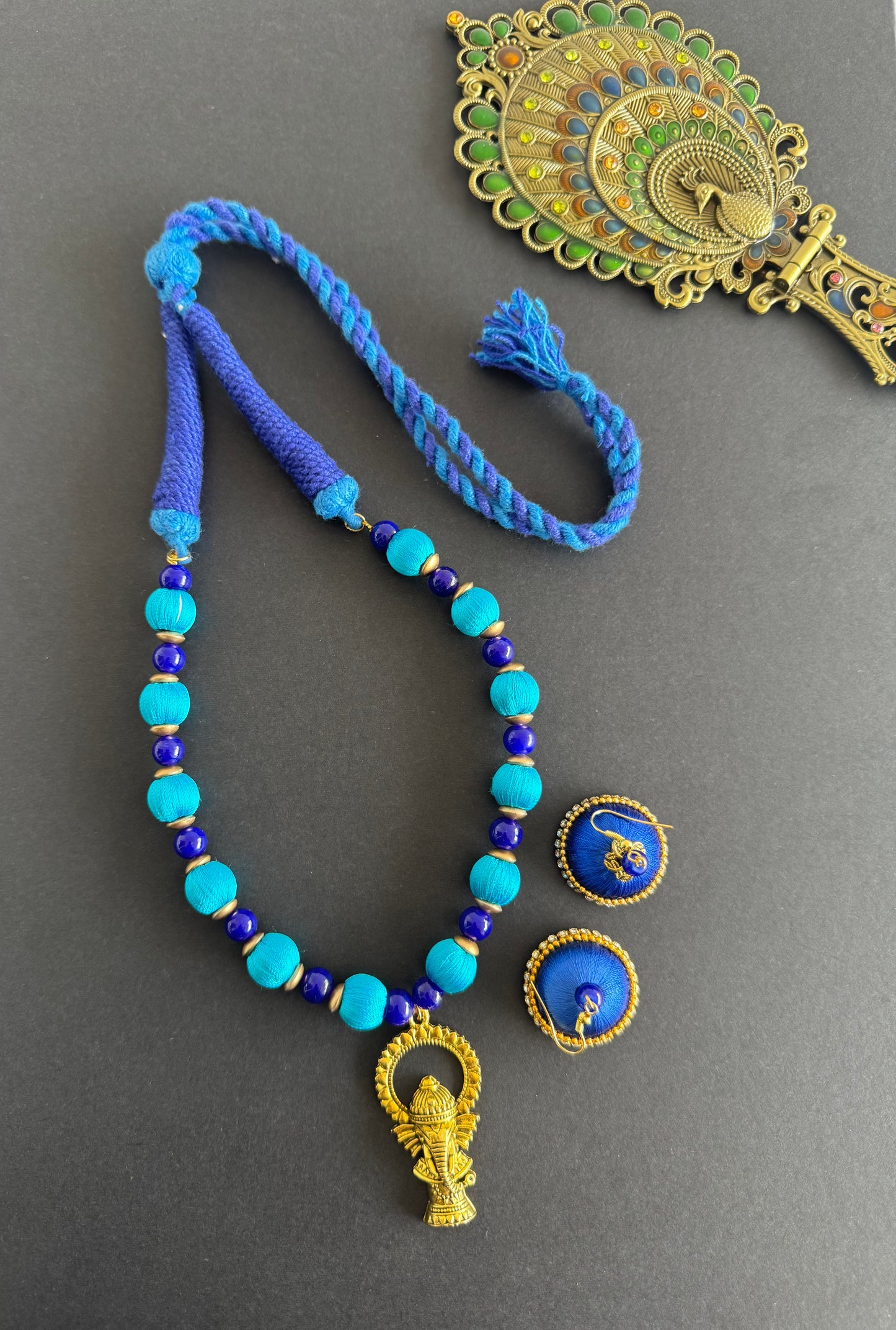 Antique gold tone blue silk thread Ganesha pendant necklace set dj-51433
