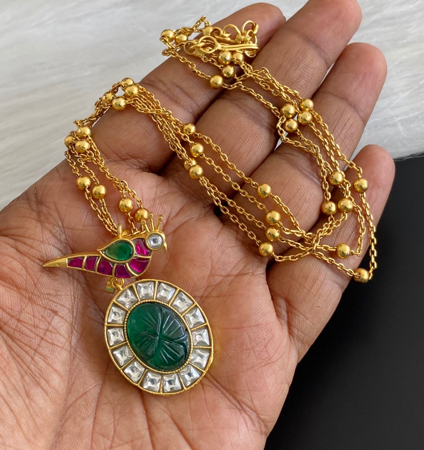 Antique gold tone kundan jadau bird pendant with chain dj-54185