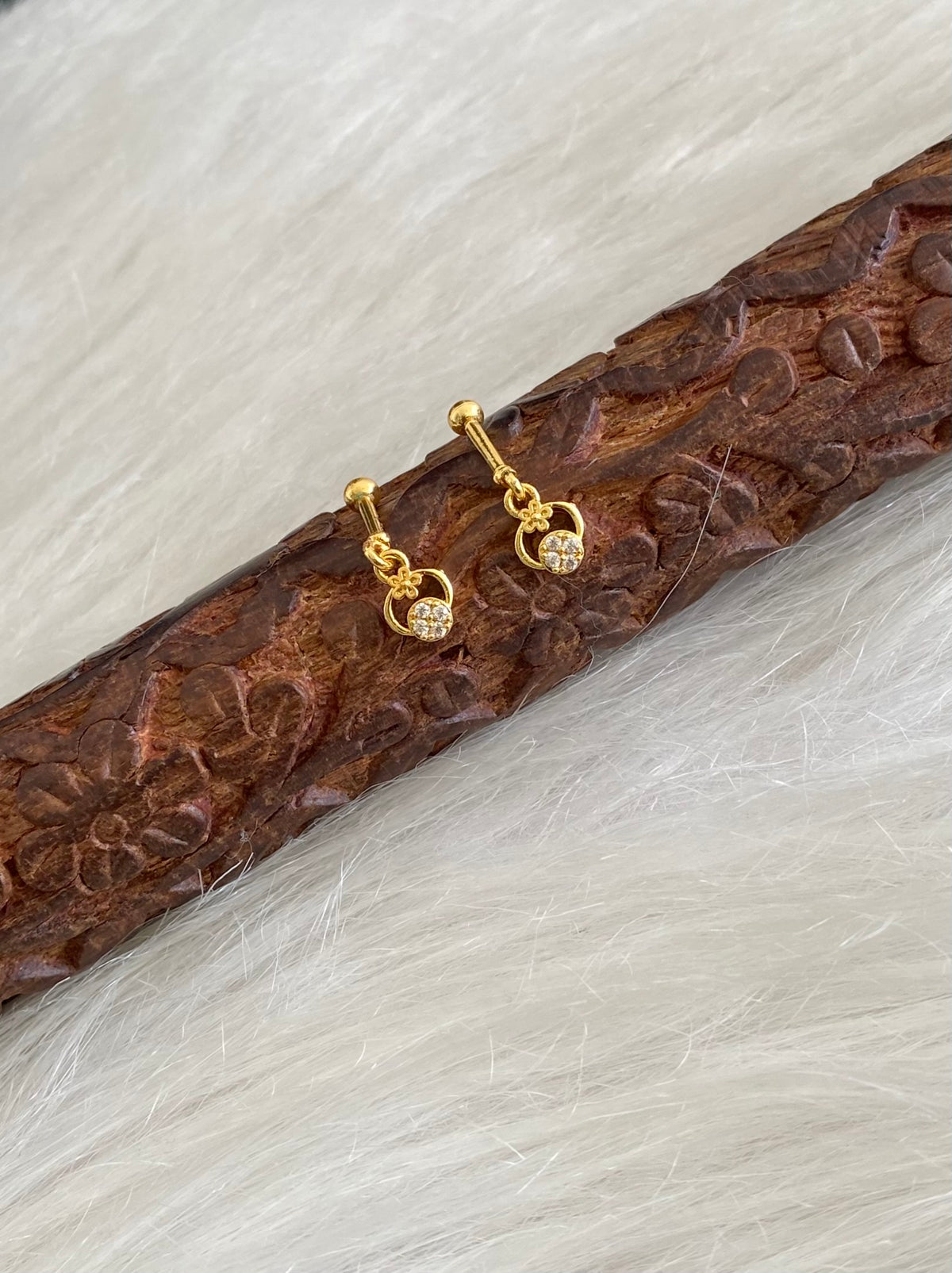 Gold tone cz white stone bugadi screw earrings dj-55126