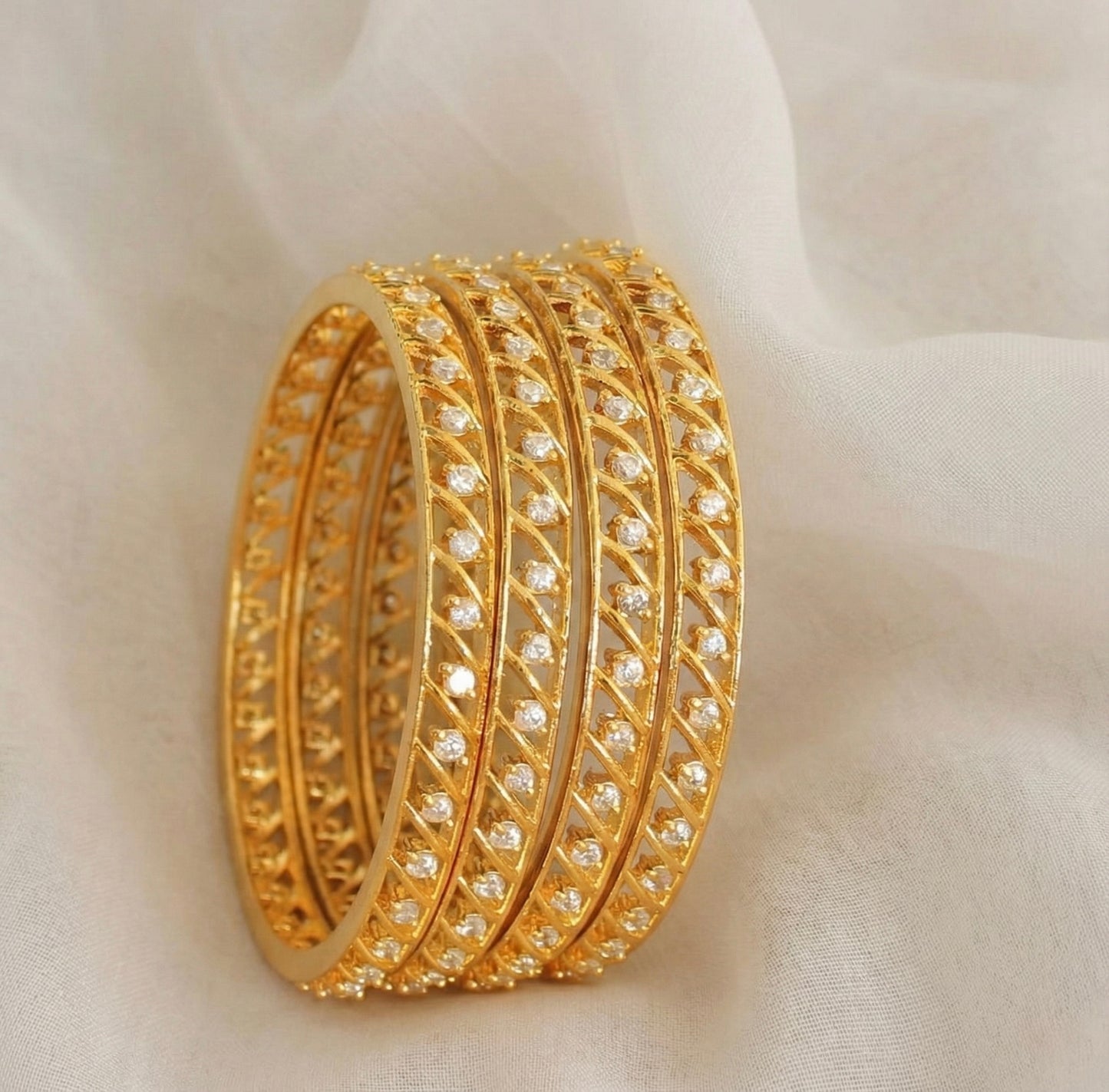 Gold tone Ad White Set of 4 Bangles (2.6) dj17295