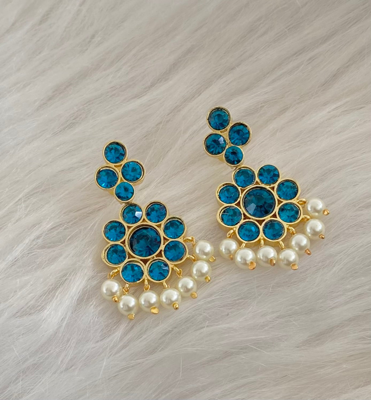 Gold tone AD cerulean blue stone pearl flower earrings dj-55136