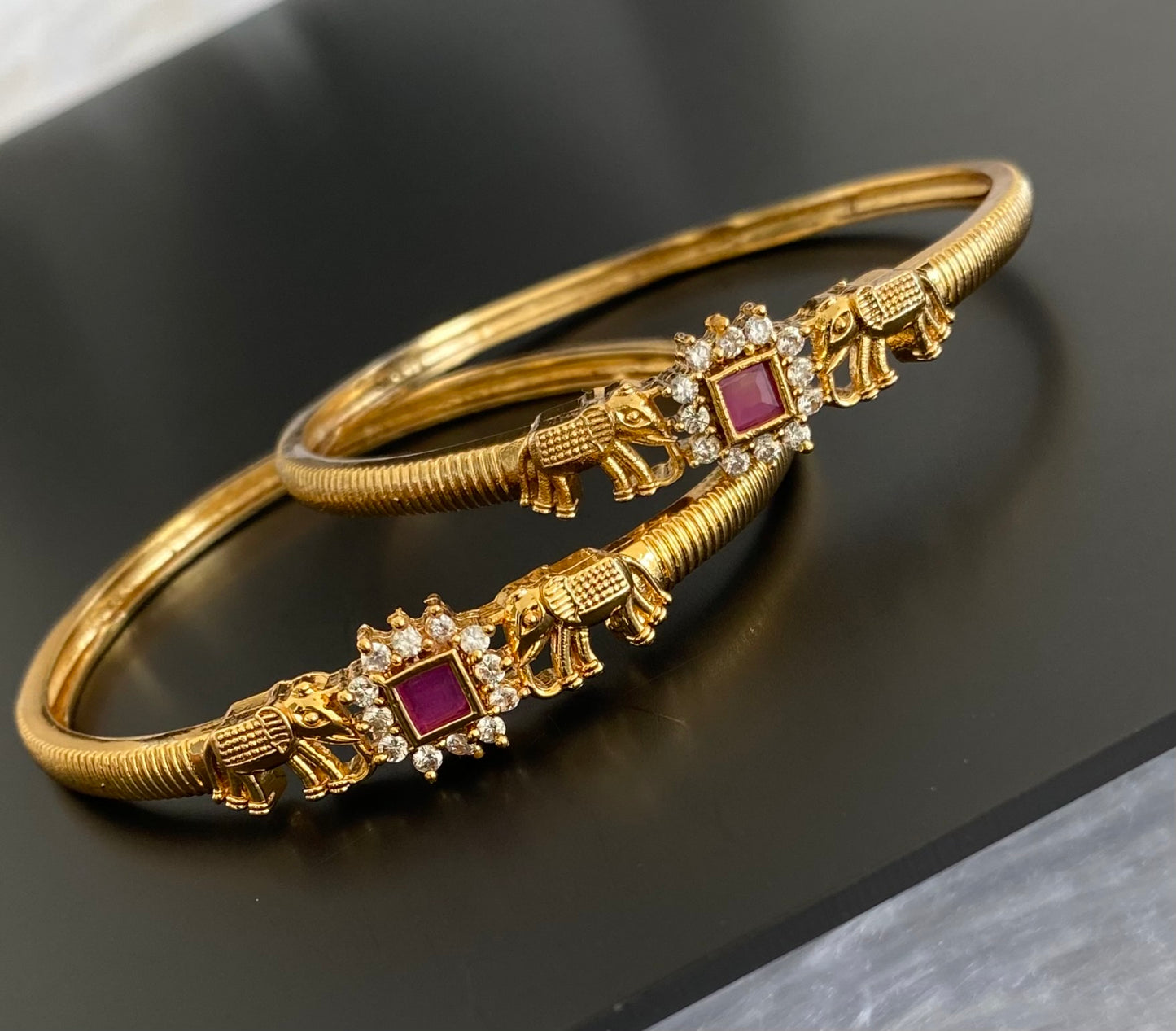 Antique gold tone pink-white stone elephant kada type bangles(2.4) dj-53595