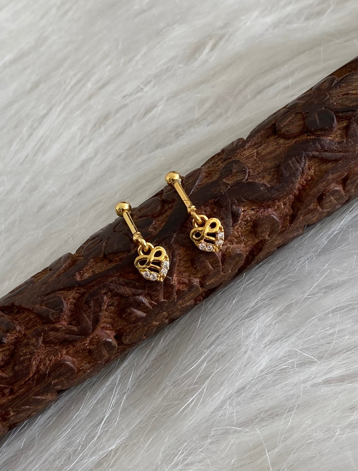 Gold tone cz white stone bugadi screw earrings dj-55127