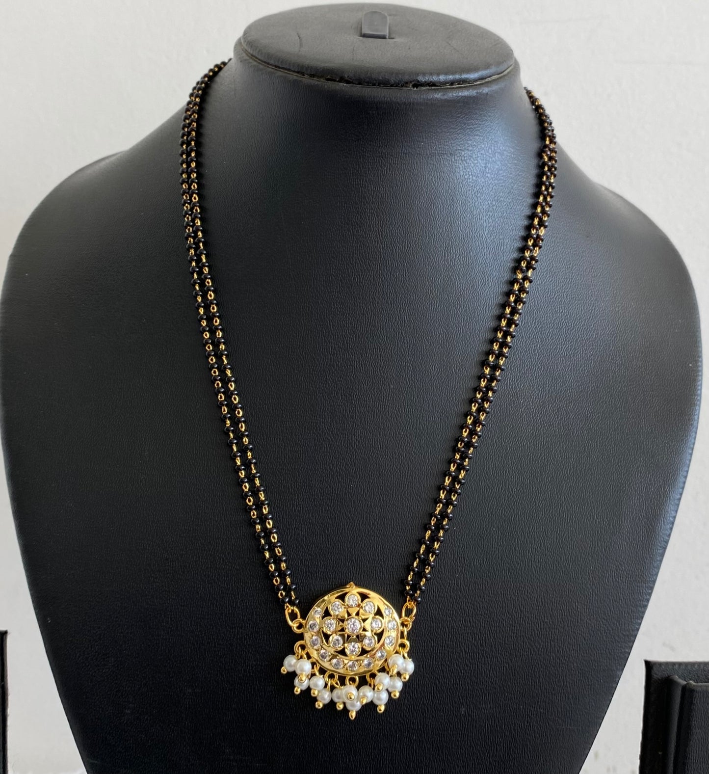 Gold tone 18 inches karimani chain with South Indian pendant dj-53423
