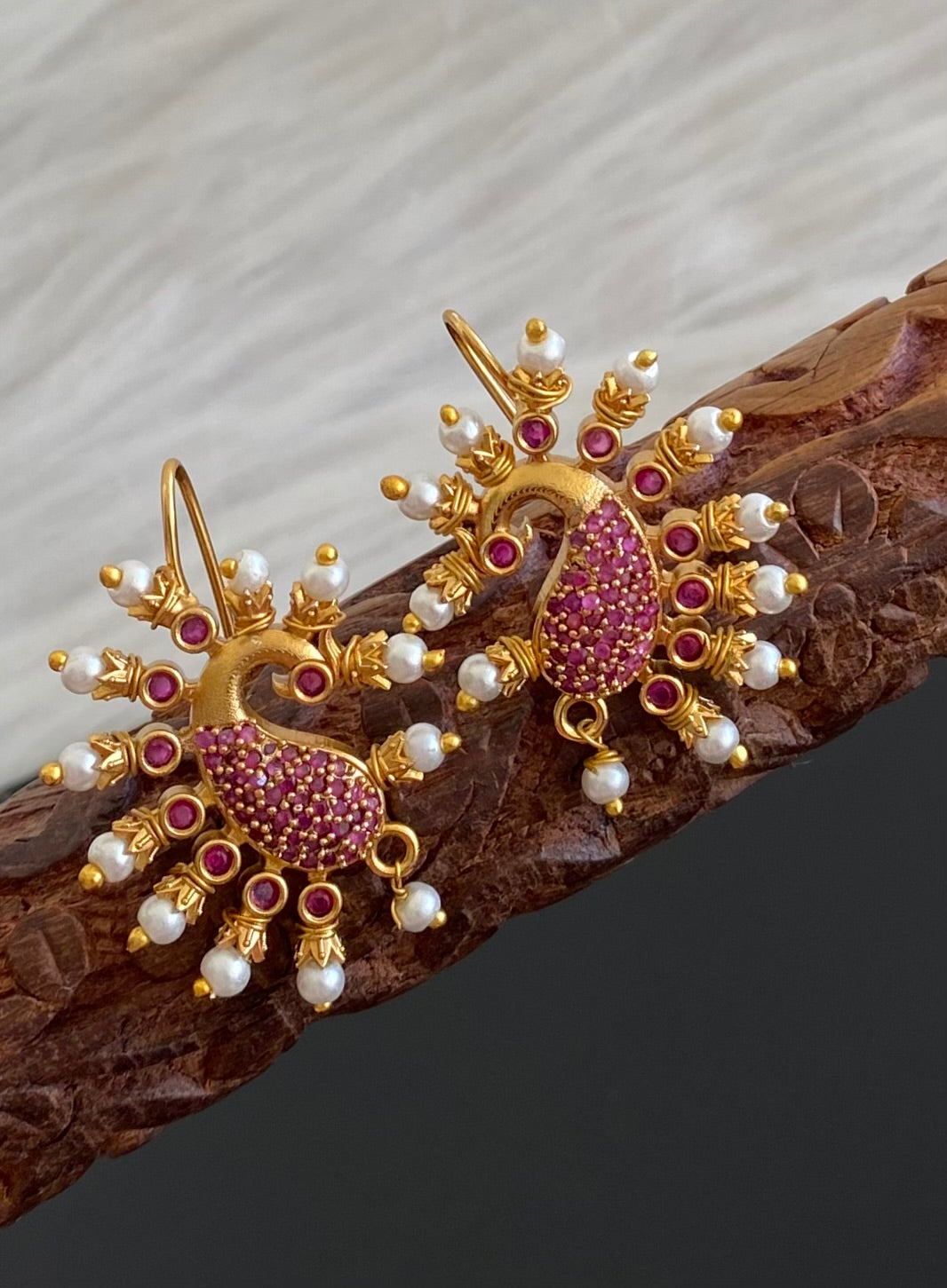 Matte gold pink stone pearl peacock bugadi earrings dj-53667
