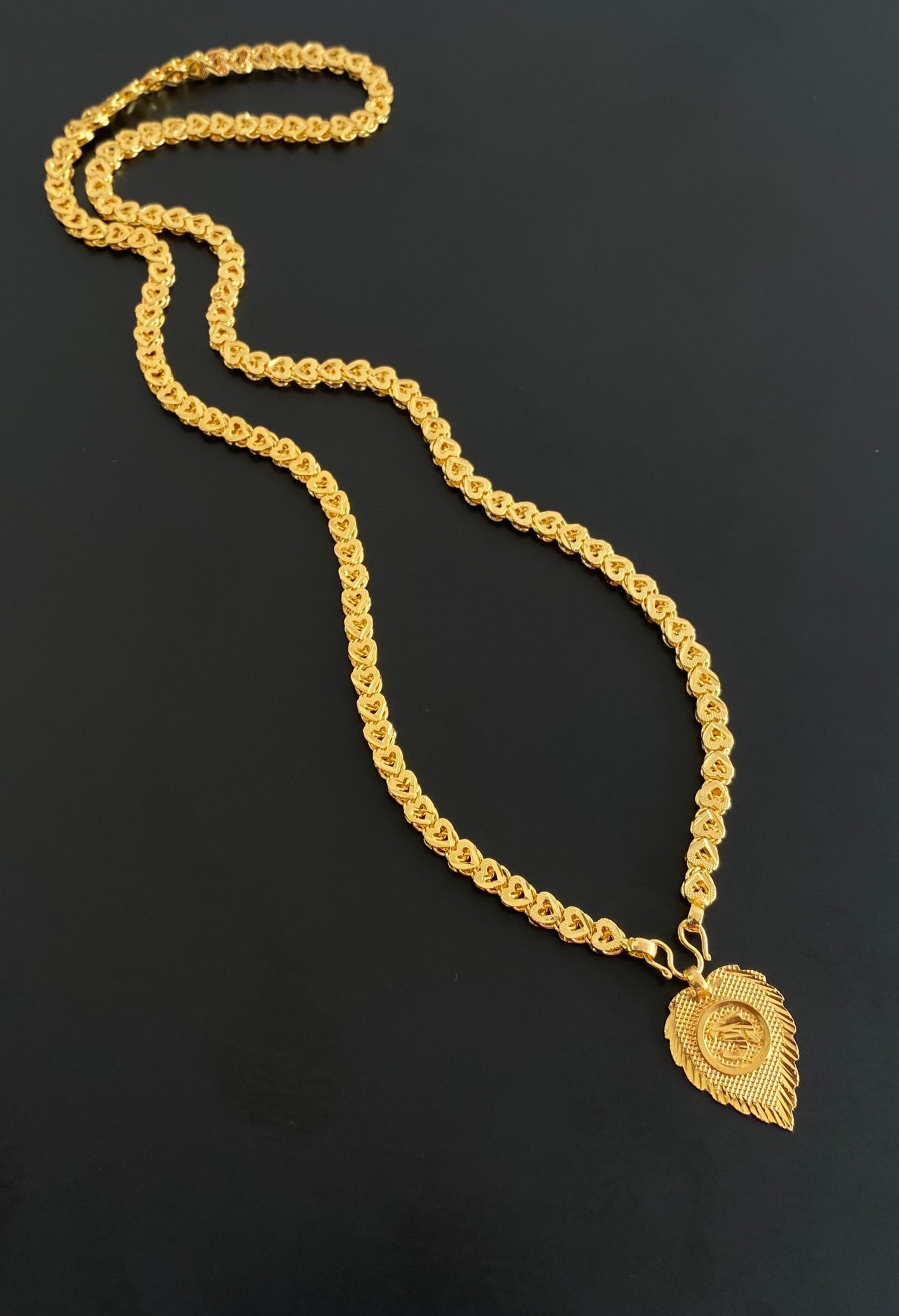 Gold tone 24 inches heart chain with om pendant dj-54380