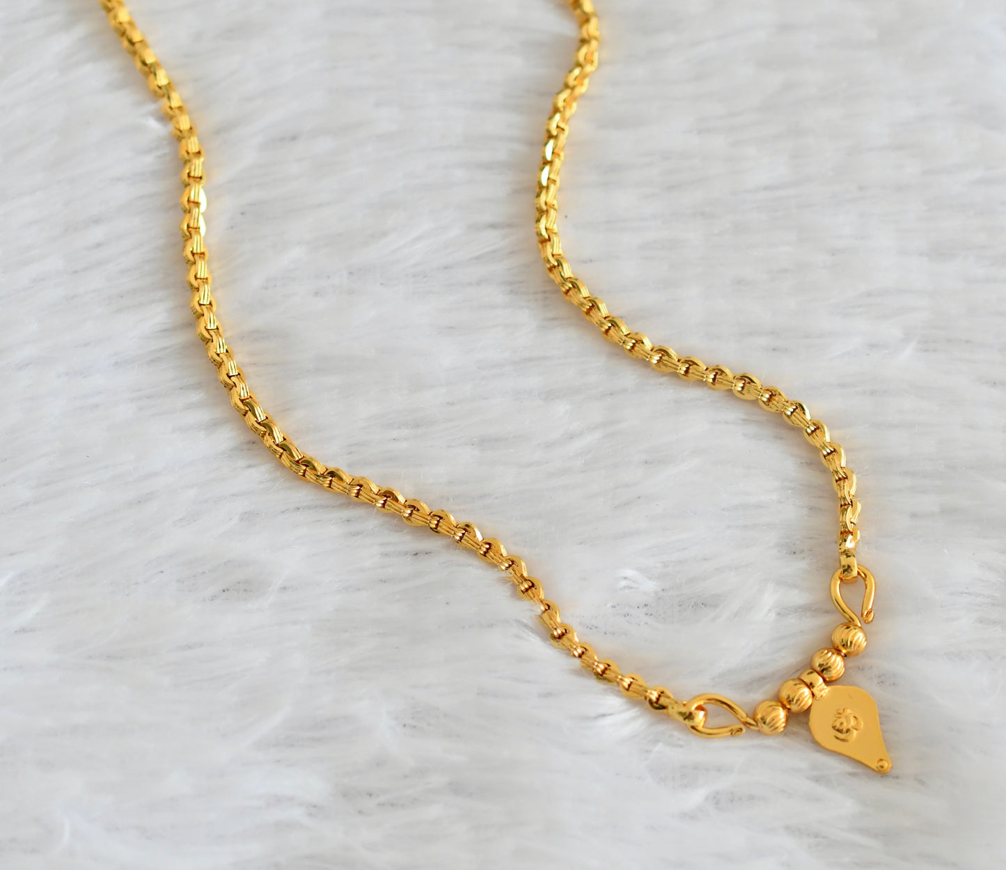 Gold tone chian with om pendant dj-53098
