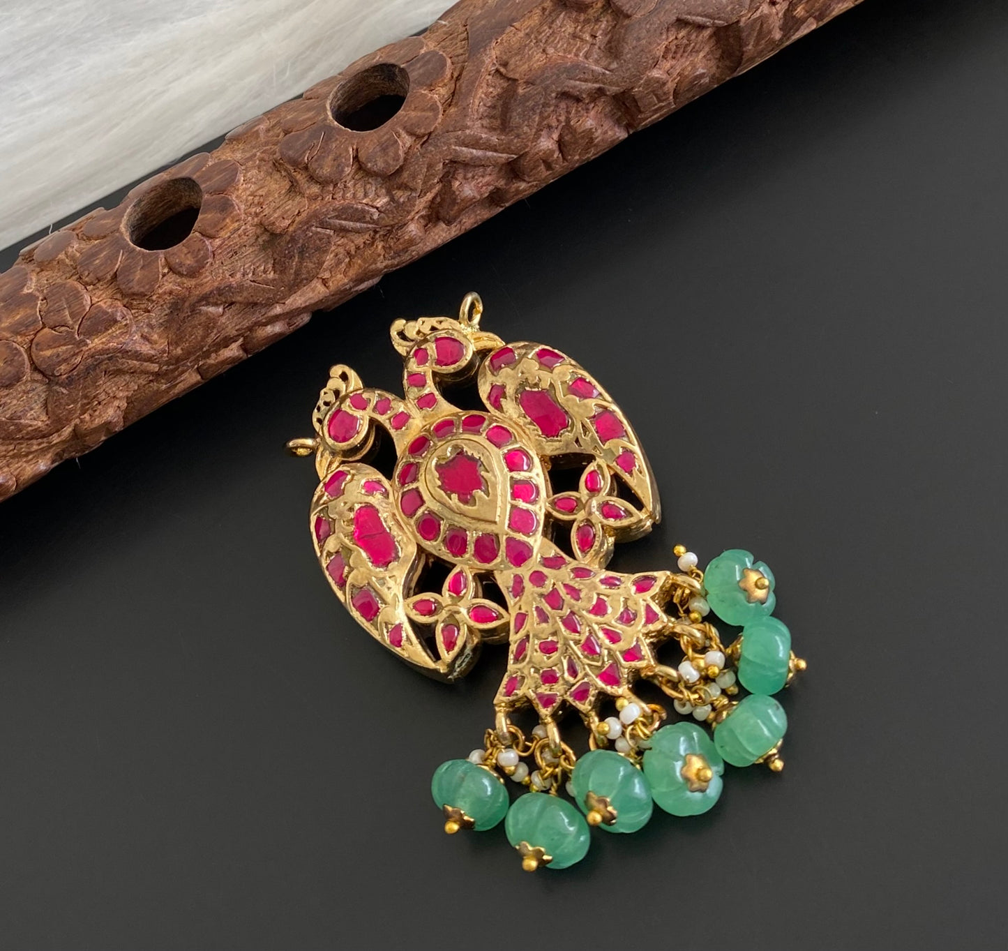 Gold tone pink-green kundan jadau reversible Gandaberunda pendant dj-53842