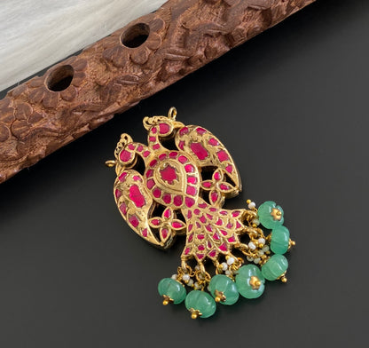 Gold tone pink-green kundan jadau reversible Gandaberunda pendant dj-53842