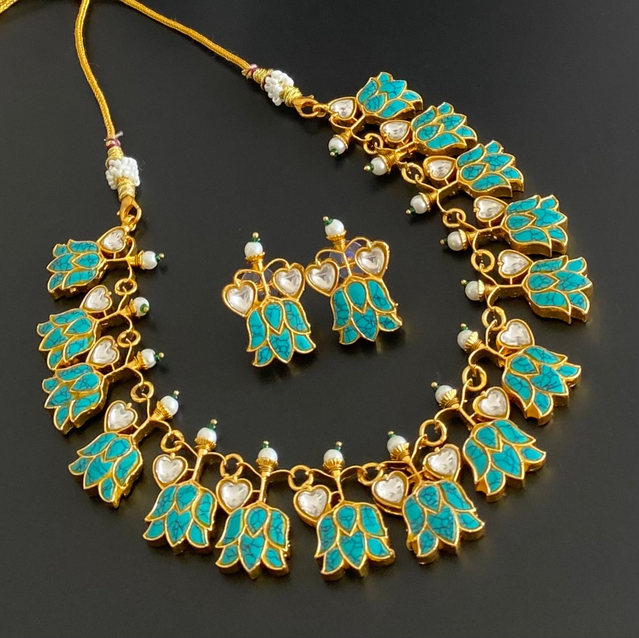 Gold tone blue-white kundan jadau lotus heart necklace set dj-53601