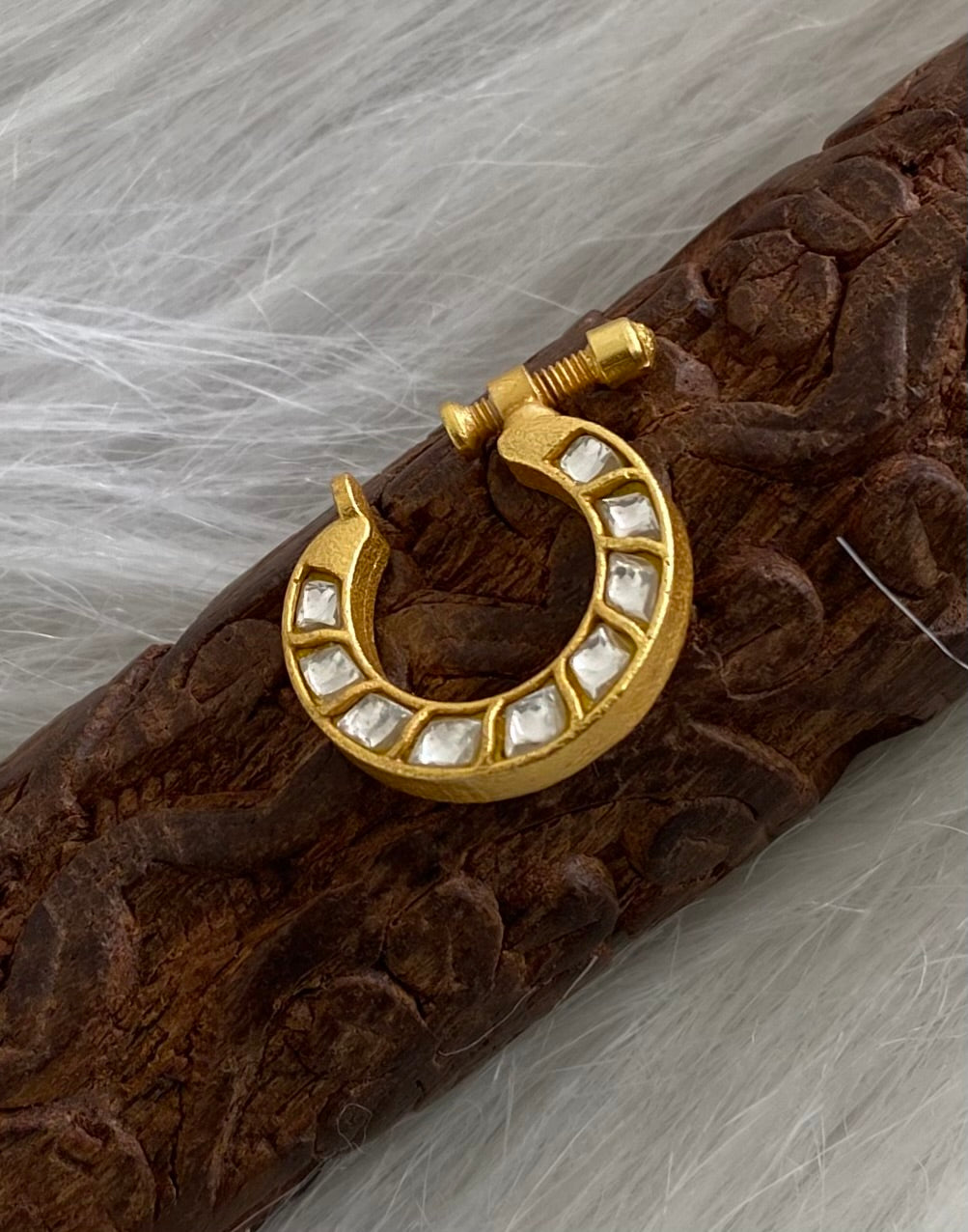 Gold tone kundan jadau white stone nose pin dj-53724