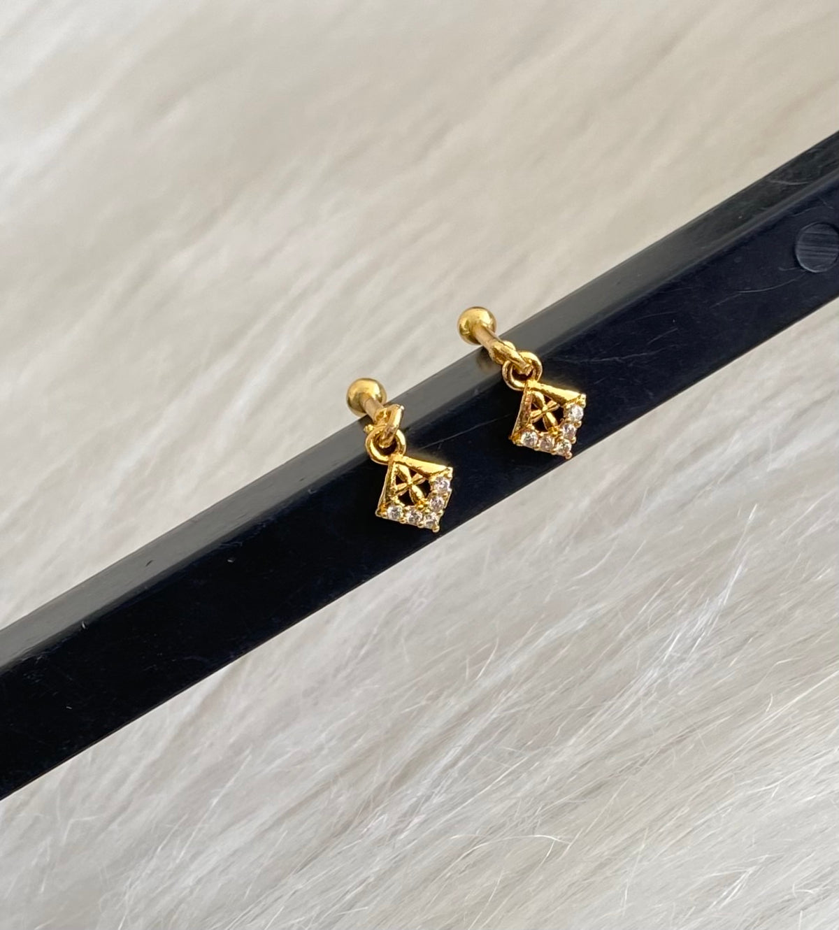 Gold tone cz white stone bugadi screw earrings dj-55124