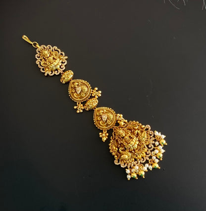Antique gold tone cz white lakshmi peacock tikka dj-52058