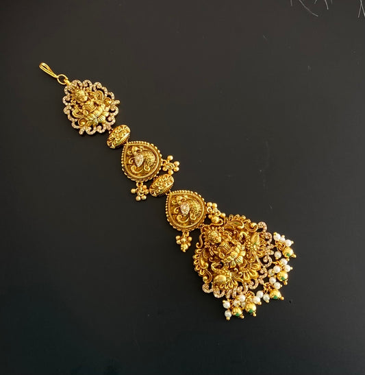 Antique gold tone cz white lakshmi peacock tikka dj-52058