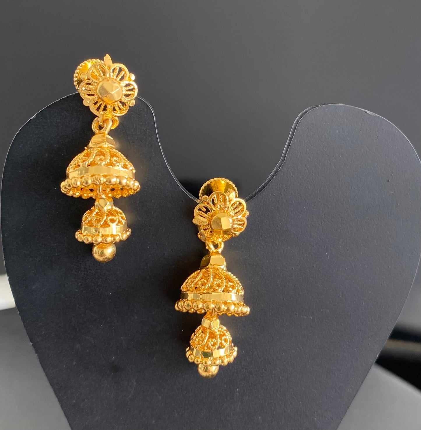 Gold tone flower screw back step jhumkka-dj52896